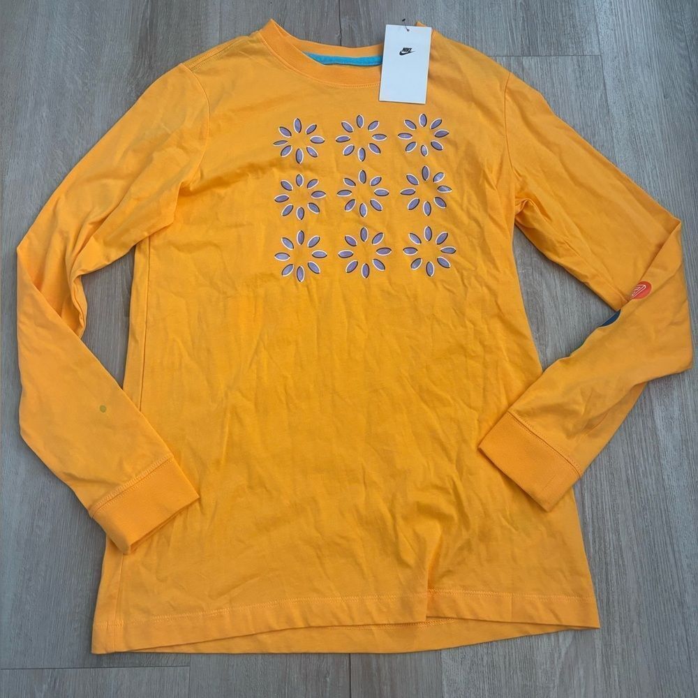 Nike Orange Shirt with Purple Floral Accents
